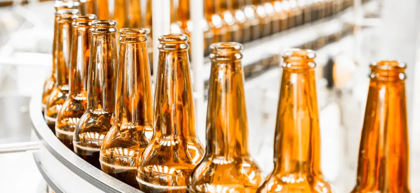 Food and Beverages Chemicals Cleaning and Sanitizing 4 bigstock_beer_bottles_on_the_conveyor_b_64917781